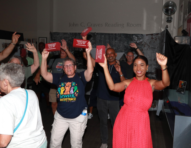 Stonewall National Museum closed Pride Month with its annual Stonewall Uprising reenactment, joined by police departments and LGBTQ+ leaders.