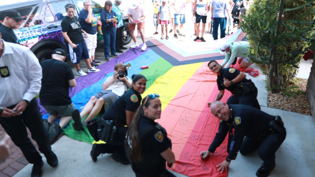 Stonewall National Museum closed Pride Month with its annual Stonewall Uprising reenactment, joined by police departments and LGBTQ+ leaders.