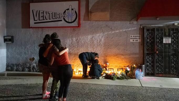 Tucson police investigate a tragic hate crime at Venture-N gay bar after two patrons were killed. The local LGBTQ+ community honors the lives lost.