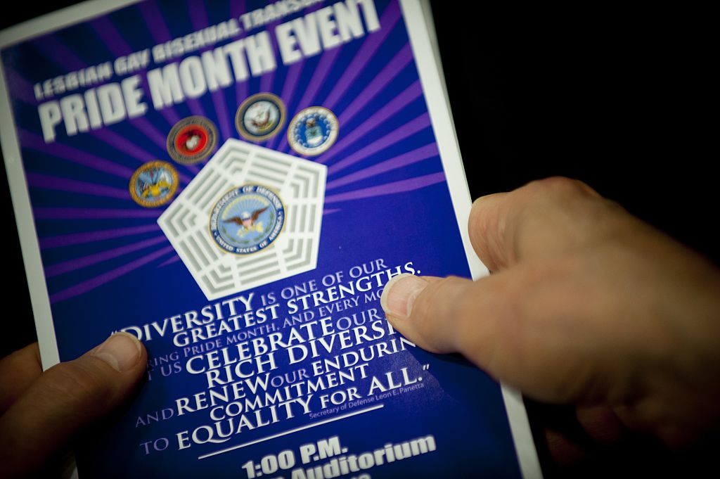 Hands holding a program at a Pentagon LGBTQ Pride Month event in 2015