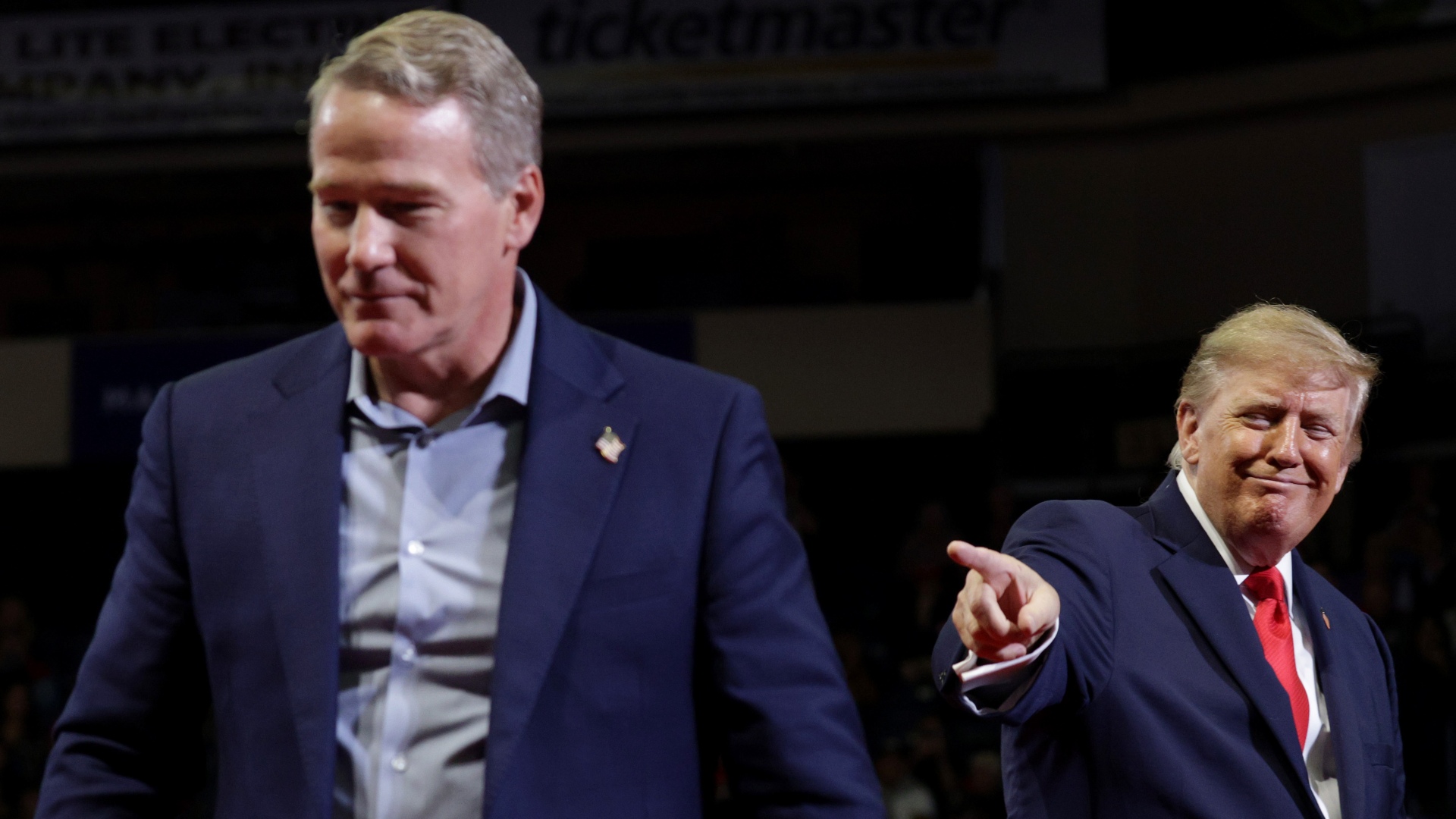 U.S. President Donald Trump (R) gestures towards U.S. Sen. Jon Husted (R-OH) as he speaks during an election rally at the Covelli Centre on October 12, 2026 in Youngstown, Ohio. President Trump is holding the rally to campaign for local Republican candidates in Ohio. (Photo by Alex Wong/Getty Images)